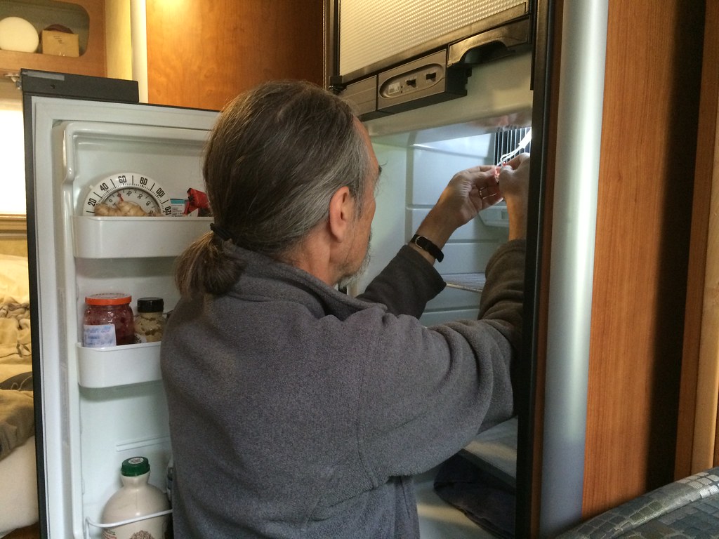 Appliance technician at work